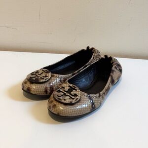 Tory Burch Reva leather ballet flats in snake print pattern.